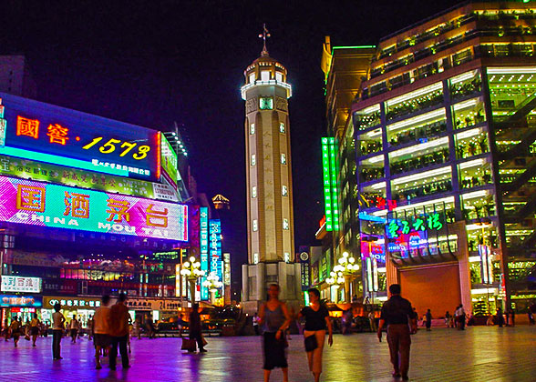 The wide neon billboard lighting the skyline of Chongqing